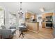 Bright kitchen featuring stainless steel appliances, hardwood floors, and adjacent sitting area at 1016 Cider Ct, Summerville, SC 29483