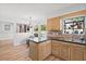 Bright kitchen with tile backsplash, stainless steel sink, and a breakfast nook at 1016 Cider Ct, Summerville, SC 29483