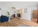 Bright living room with a decorative brick fireplace and ample natural light at 1016 Cider Ct, Summerville, SC 29483