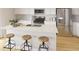 Modern kitchen features a spacious island, stainless steel appliances, and subway tile backsplash at 1017 Swamp Rose Run, Summerville, SC 29485