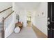 Inviting entryway with neutral decor, wood floors, and a view of the living area at 1021 Swamp Rose Run, Summerville, SC 29485