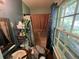 Bathroom features a window, a mirror, and some storage; needs a deep cleaning and repairs at 1022 Miles Jamison Rd, Summerville, SC 29485