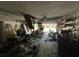 Garage interior showing clutter and equipment; in need of organizing and cleaning at 1022 Miles Jamison Rd, Summerville, SC 29485