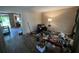 The home's living room area with wood-look floors and views into other parts of the house at 1022 Miles Jamison Rd, Summerville, SC 29485