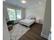 Cozy bedroom featuring natural light, a comfortable bed, and stylish decor for a relaxing atmosphere at 104 Pine Waters Ln, Summerville, SC 29483