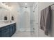 Bright bathroom with modern glass shower, vanity, and white subway tiles at 104 Pine Waters Ln, Summerville, SC 29483