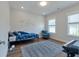 Bright bedroom with hardwood floors, area rug, and natural lighting at 104 Pine Waters Ln, Summerville, SC 29483