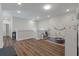Inviting bonus room with hardwood floors, a cozy play area, and ample space for activities at 104 Pine Waters Ln, Summerville, SC 29483