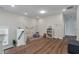Spacious bonus room with hardwood floors, playful wall decor, and plenty of natural light at 104 Pine Waters Ln, Summerville, SC 29483