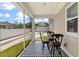 Charming screened patio with tile flooring and comfortable seating, perfect for relaxing outdoors at 104 Pine Waters Ln, Summerville, SC 29483