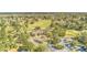 Aerial view of a community clubhouse and golf course, offering recreational amenities in a picturesque setting at 105 Irish Oak Dr, Goose Creek, SC 29445