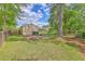 Beautiful backyard with a screened-in porch and a paved patio, perfect for outdoor entertaining and relaxation at 105 Irish Oak Dr, Goose Creek, SC 29445
