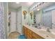 Bathroom featuring double sinks, neutral decor, and ample lighting at 105 Irish Oak Dr, Goose Creek, SC 29445