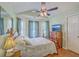 Charming bedroom with hardwood floors, neutral walls, and a large window offering natural light and great ambiance at 105 Irish Oak Dr, Goose Creek, SC 29445