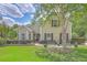 Charming home with manicured lawn, benches, and mature landscaping offering pleasant curb appeal at 105 Irish Oak Dr, Goose Creek, SC 29445