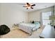 Bright bedroom with dinosaur wall decor, ceiling fan and carpeted floor at 106 Wrigley Blvd, Summerville, SC 29485