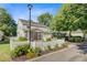 Charming home with a screened porch, white picket fence, and beautiful landscaping at 106 Wrigley Blvd, Summerville, SC 29485