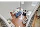 Open concept living room with hardwood floors, fireplace, and ample natural light at 106 Wrigley Blvd, Summerville, SC 29485