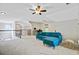 Spacious loft area with comfortable seating and a ceiling fan at 106 Wrigley Blvd, Summerville, SC 29485