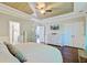 Bright main bedroom with wood floors, en suite bathroom, and double closets at 106 Wrigley Blvd, Summerville, SC 29485