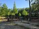 Relaxing pond view with fountain and wooden viewing deck in a serene setting at 106 Wrigley Blvd, Summerville, SC 29485