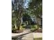 Neighborhood sidewalk surrounded by trees and well-maintained landscaping between homes at 106 Wrigley Blvd, Summerville, SC 29485