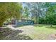 Back exterior of a home with a covered patio and AC unit at 108 Helen Dr, Summerville, SC 29483
