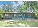 Rear exterior of a home with windows and utility boxes at 108 Helen Dr, Summerville, SC 29483
