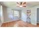 Bright bedroom featuring hardwood floors and a decorative barn door at 108 Helen Dr, Summerville, SC 29483
