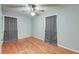 This quaint bedroom has hardwood floors, ceiling fan and natural light at 108 Helen Dr, Summerville, SC 29483