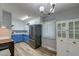 This blue and white kitchen is bright and has updated appliances at 108 Helen Dr, Summerville, SC 29483