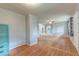 Open-concept living room with hardwood floors, neutral walls, and ceiling fan at 108 Helen Dr, Summerville, SC 29483