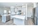 Stylish kitchen featuring gray cabinets, stainless appliances, and functional center island at 1110 Sapling Dr, Summerville, SC 29485