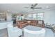 Cozy living room showcases a large leather sectional, with views of the eat-in kitchen at 1110 Sapling Dr, Summerville, SC 29485