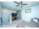 Upstairs living area featuring a sofa, TV on a stand, and a ceiling fan at 1110 Sapling Dr, Summerville, SC 29485