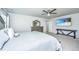 Airy main bedroom featuring a TV, ceiling fan and large bed for relaxation and comfort at 1110 Sapling Dr, Summerville, SC 29485
