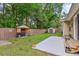 Spacious backyard featuring a grill under a gazebo, storage shed, and a patio with a seating area at 112 Red Cypress Dr, Goose Creek, SC 29445