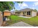 Backyard with a grill area, a patio, and a view of the rear exterior of the house at 112 Red Cypress Dr, Goose Creek, SC 29445