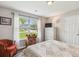 Cozy bedroom with a window view, complemented by a decorative cabinet and a comfortable-looking bed at 112 Red Cypress Dr, Goose Creek, SC 29445