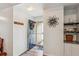 Stylish entryway with a dark blue door, wood floors and decorative wall accents at 112 Red Cypress Dr, Goose Creek, SC 29445