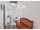 Hallway featuring hardwood floors, a wooden bench, and white walls with doors at 112 Red Cypress Dr, Goose Creek, SC 29445