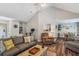 Spacious living room with hardwood floors and a cozy seating area, perfect for entertaining guests or relaxing at 112 Red Cypress Dr, Goose Creek, SC 29445
