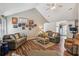 Cozy living room with hardwood floors, comfortable seating, and stylish decor, creating an inviting atmosphere at 112 Red Cypress Dr, Goose Creek, SC 29445