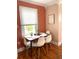 Dining room with table and six chairs near a window at 1159 Camden St, North Charleston, SC 29405