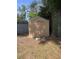 A tan shed is in the backyard next to a metal shed offering convenient storage at 117 Weiters St, Walterboro, SC 29488