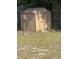 A backyard shed offers convenient storage, with a rustic lantern nearby at 117 Weiters St, Walterboro, SC 29488