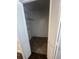 Louvered doors open to closet with shelving and tile floor at 117 Weiters St, Walterboro, SC 29488