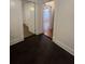 Hallway showcases wood flooring and white trim at 117 Weiters St, Walterboro, SC 29488