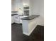 Bright kitchen featuring white cabinets, sleek countertops, and modern appliances at 117 Weiters St, Walterboro, SC 29488
