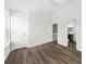 Spacious bedroom with wood-look floors and multiple entry points at 122 Hornby Cir, Goose Creek, SC 29445